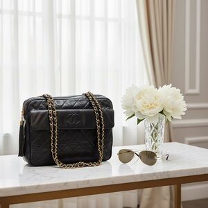 CHANEL Black Quilted Crossbody Bag with Gold Chain